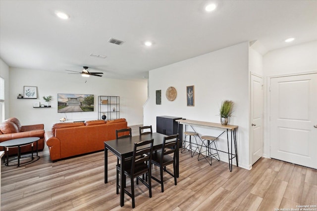 dining room with a ceiling fan, visible vents, recessed lighting, and light wood-type flooring
