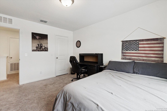 bedroom featuring visible vents, carpet flooring, and baseboards