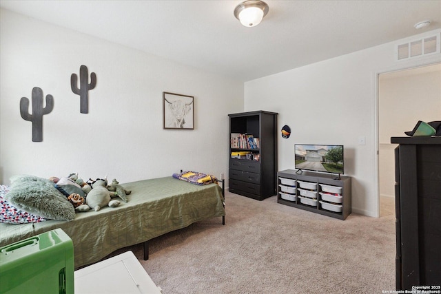 carpeted bedroom with visible vents