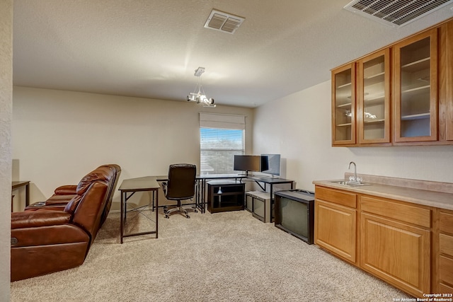 3234 Bending Crk, San Antonio, TX 78261 - interior space featuring light colored carpet, visible vents, glass insert cabinets, and a sink