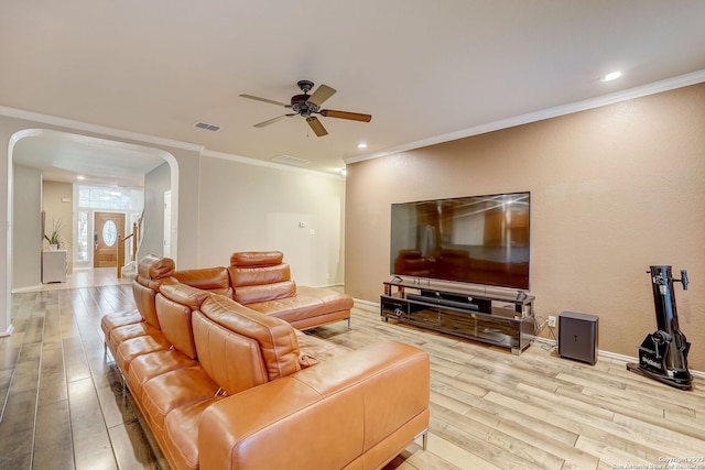 3234 Bending Crk, San Antonio, TX 78261 - living area featuring ceiling fan, visible vents, arched walkways, light wood finished floors, and ornamental molding