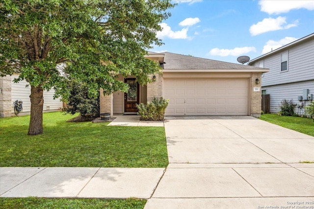 view of front of property with an attached garage, driveway, brick siding, and a front yard