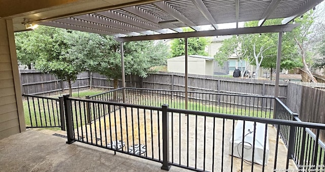 exterior space featuring a pergola and a fenced backyard