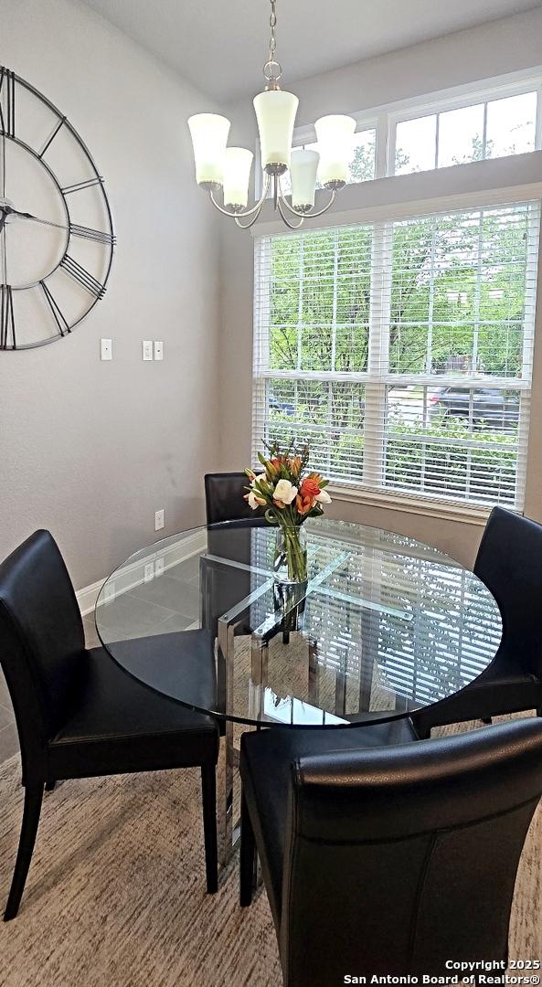 dining room featuring an inviting chandelier