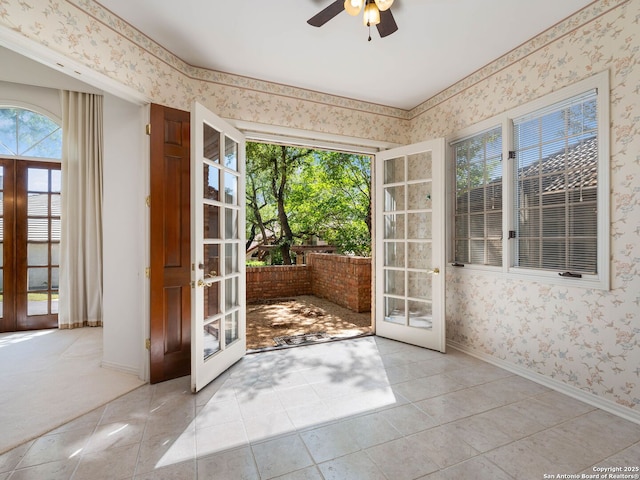 9 Chester Downs, San Antonio, TX 78257 - entryway with a ceiling fan, french doors, and wallpapered walls