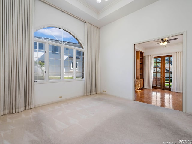 9 Chester Downs, San Antonio, TX 78257 - carpeted empty room featuring crown molding, baseboards, ceiling fan, and french doors