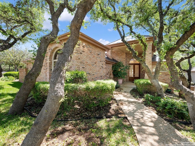 9 Chester Downs, San Antonio, TX 78257 - view of front facade featuring brick siding