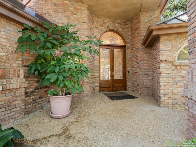 9 Chester Downs, San Antonio, TX 78257 - entrance to property with brick siding and french doors