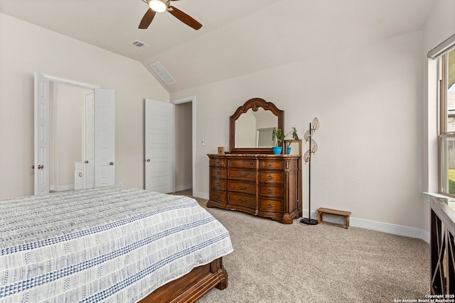 bedroom featuring carpet flooring, baseboards, visible vents, and vaulted ceiling