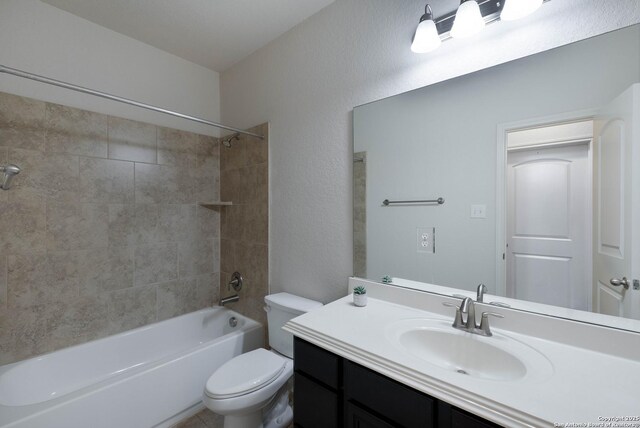 full bathroom featuring vanity, shower / bathing tub combination, and toilet