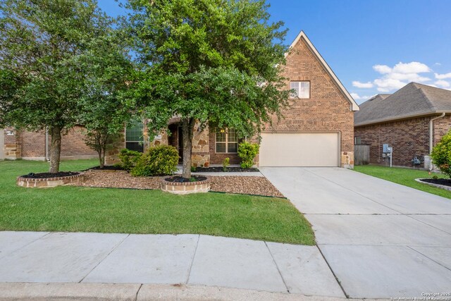 view of front of house with brick siding, an attached garage, driveway, and a front yard