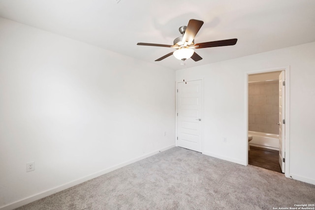 2910 Martin Luther King, San Antonio, TX 78220 - unfurnished bedroom featuring baseboards, carpet, ensuite bathroom, and ceiling fan