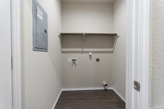 washroom with laundry area, wood finished floors, hookup for a washing machine, electric panel, and hookup for an electric dryer