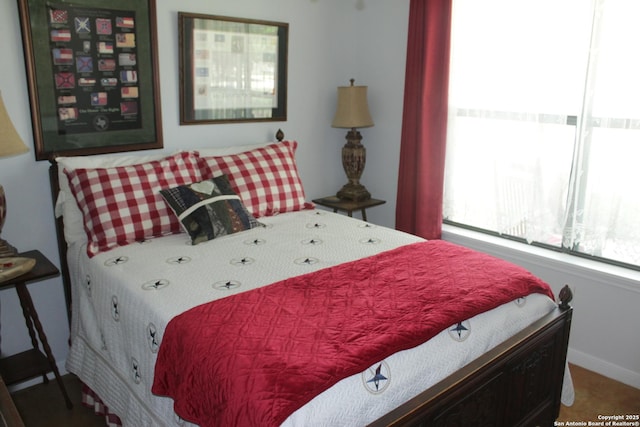 bedroom with baseboards