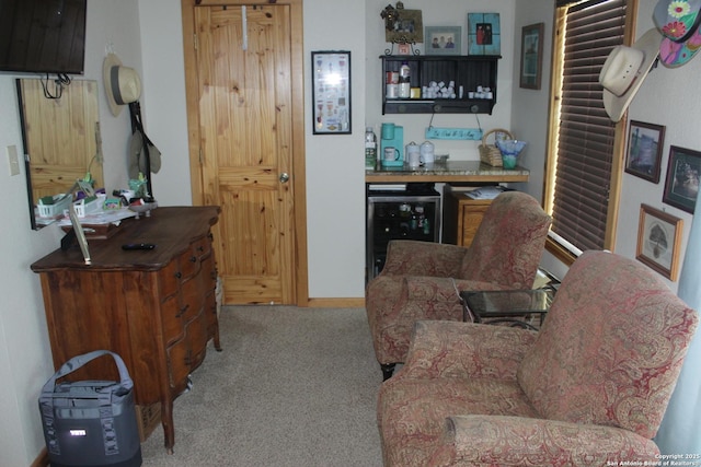 living room with carpet flooring and beverage cooler