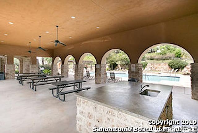 17739 Via Del Oro, San Antonio, TX 78257 - exterior space with a sink, a patio, and a swimming pool