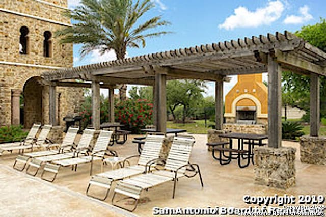 17739 Via Del Oro, San Antonio, TX 78257 - view of community featuring a patio and a pergola