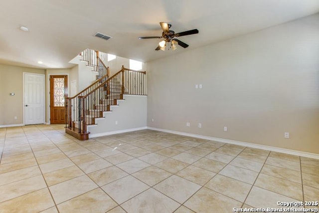 17739 Via Del Oro, San Antonio, TX 78257 - interior space with light tile patterned floors, ceiling fan, stairway, and visible vents