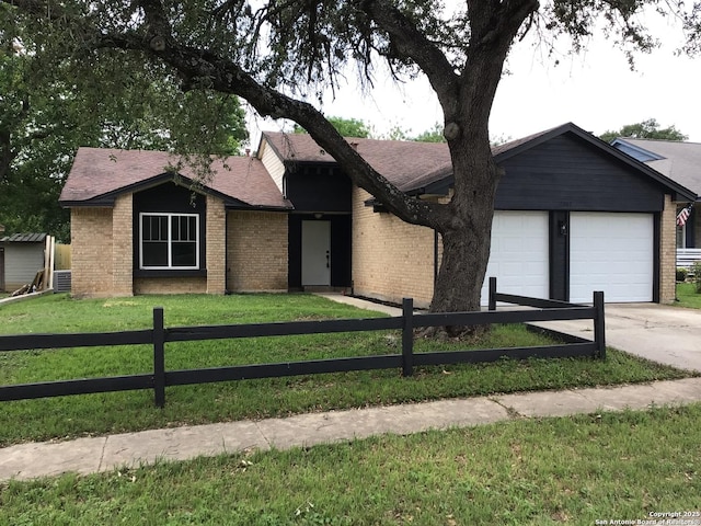 single story home featuring fence private yard and brick siding