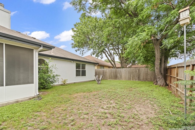 view of yard featuring a fenced backyard