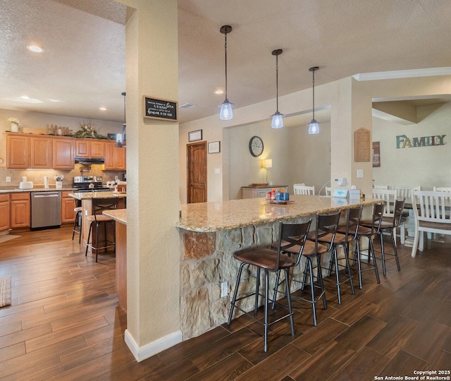 bar featuring recessed lighting, stainless steel dishwasher, dark wood-style floors, and a textured ceiling