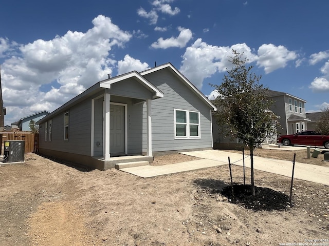 8823 Astral Pl, San Antonio, TX 78252 - back of house with fence and central AC unit