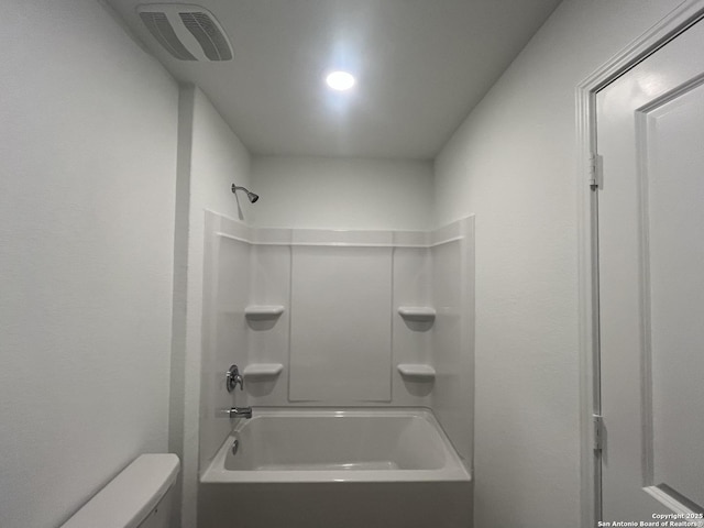 8823 Astral Pl, San Antonio, TX 78252 - bathroom with bathtub / shower combination, toilet, and visible vents