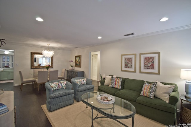 living room with visible vents, crown molding, a chandelier, recessed lighting, and dark wood-type flooring