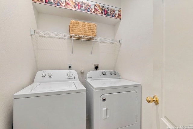 clothes washing area with laundry area and independent washer and dryer