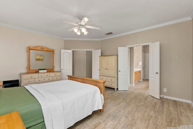 bedroom featuring crown molding, light wood-type flooring, and visible vents