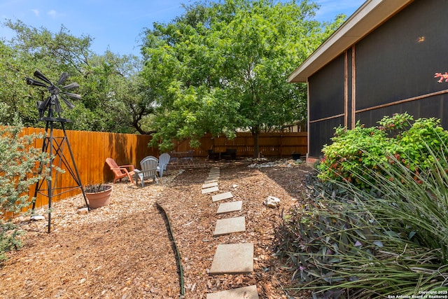 view of yard with a fenced backyard