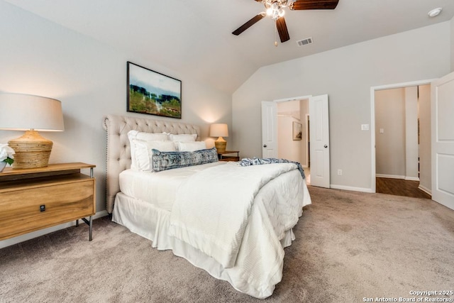 carpeted bedroom featuring baseboards, a ceiling fan, lofted ceiling, and visible vents