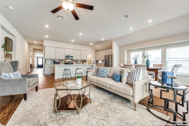 11922 Tower Crk, San Antonio, TX 78253 - living room with a wealth of natural light, a ceiling fan, light wood finished floors, and visible vents