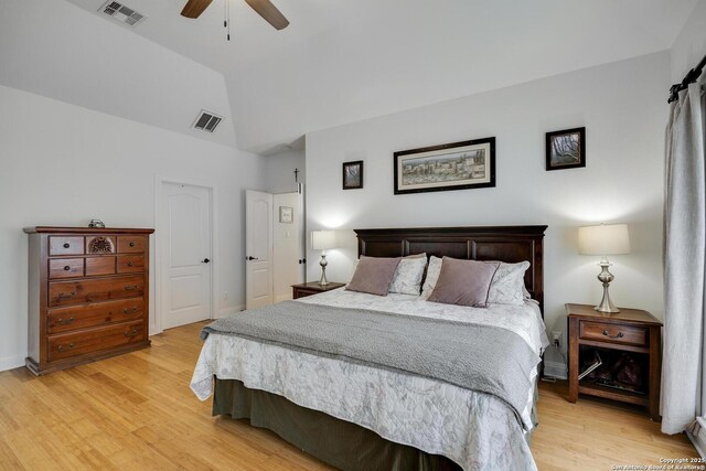 16812 Fox Rdg, Helotes, TX 78023 - bedroom featuring a ceiling fan, visible vents, a baseboard heating unit, and light wood finished floors