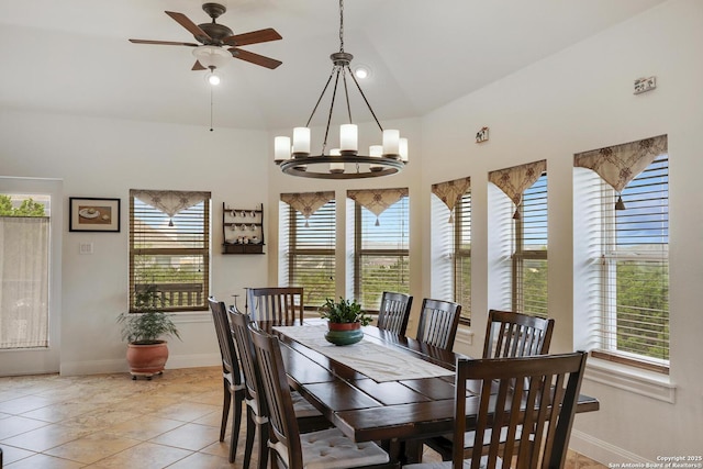 16812 Fox Rdg, Helotes, TX 78023 - dining room with baseboards, plenty of natural light, light tile patterned floors, and ceiling fan with notable chandelier