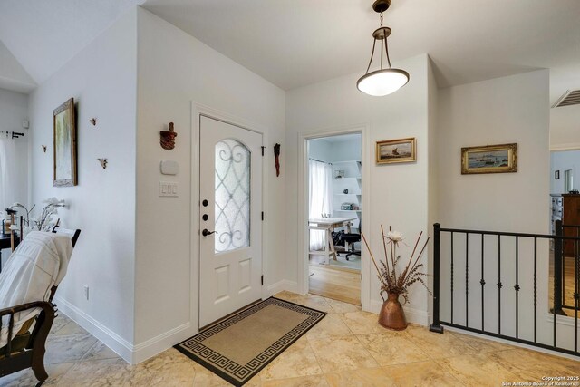 16812 Fox Rdg, Helotes, TX 78023 - foyer entrance with baseboards and visible vents