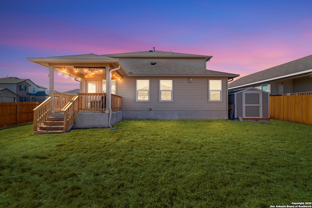4704 Paluxy, San Antonio, TX 78253 - back of house featuring a storage shed, an outbuilding, a yard, and a fenced backyard