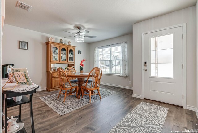 4704 Paluxy, San Antonio, TX 78253 - dining space with baseboards, a ceiling fan, wood finished floors, and visible vents