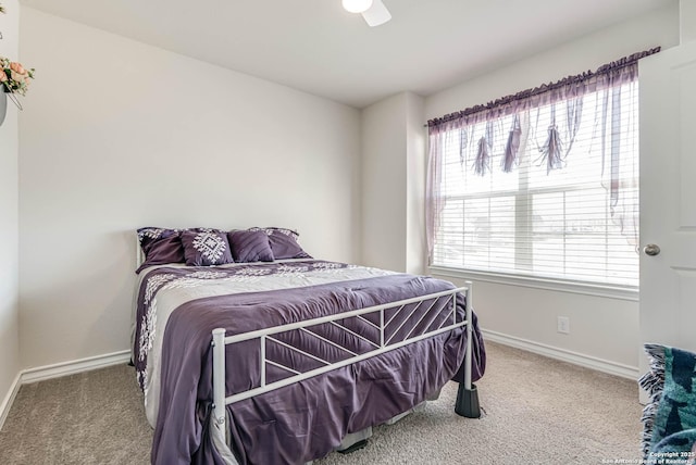 4704 Paluxy, San Antonio, TX 78253 - carpeted bedroom with baseboards, ceiling fan, and multiple windows