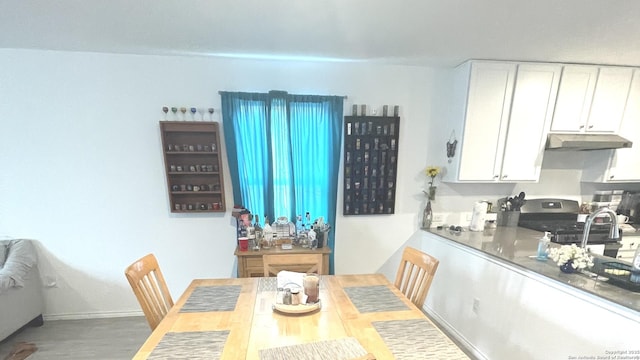 dining area featuring wood finished floors