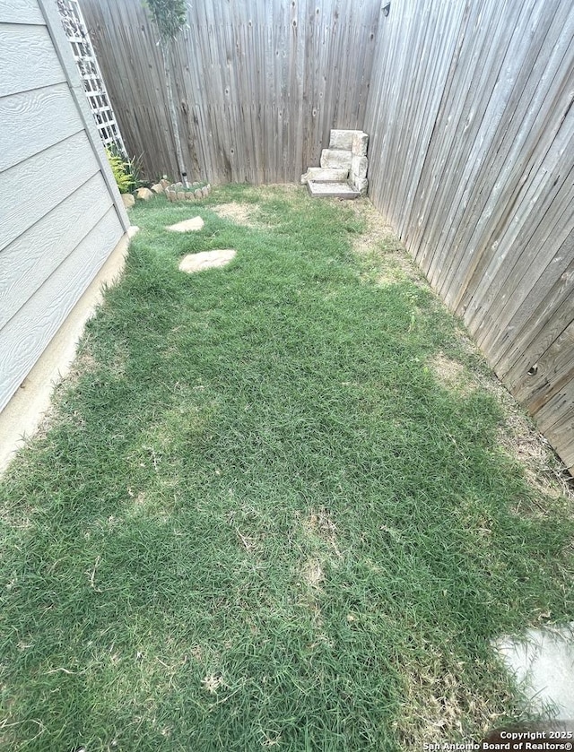 view of yard with fence