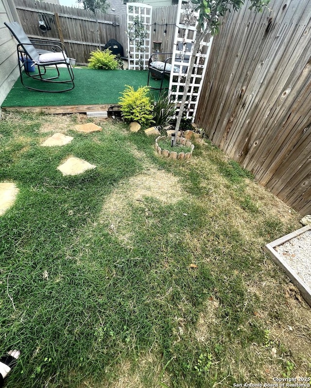 view of yard with fence