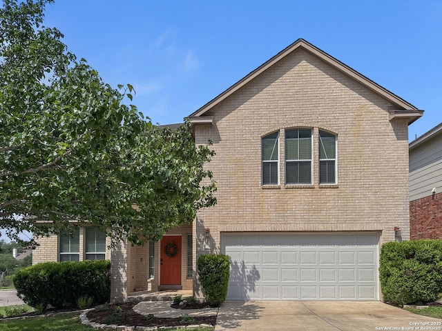 51 Roan, San Antonio, TX 78259 - view of front facade featuring brick siding, a garage, and concrete driveway