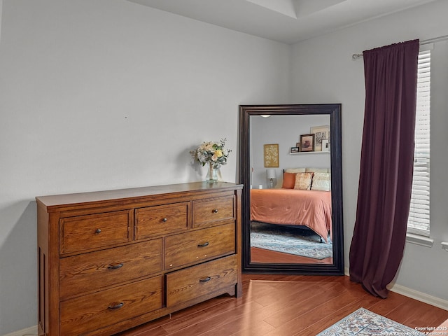 51 Roan, San Antonio, TX 78259 - bedroom featuring baseboards and wood finished floors