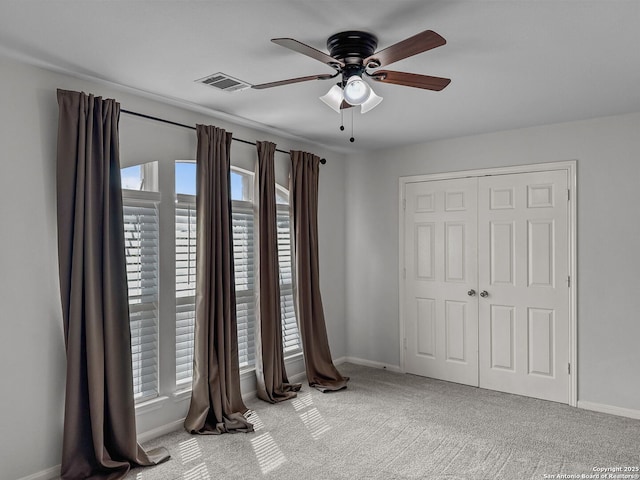 51 Roan, San Antonio, TX 78259 - spare room with plenty of natural light, a ceiling fan, carpet flooring, and visible vents