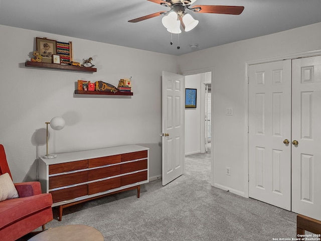 51 Roan, San Antonio, TX 78259 - bedroom featuring a ceiling fan, baseboards, carpet, and a closet