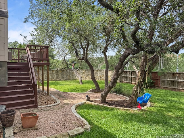 51 Roan, San Antonio, TX 78259 - view of yard featuring a fenced backyard, stairway, and a deck