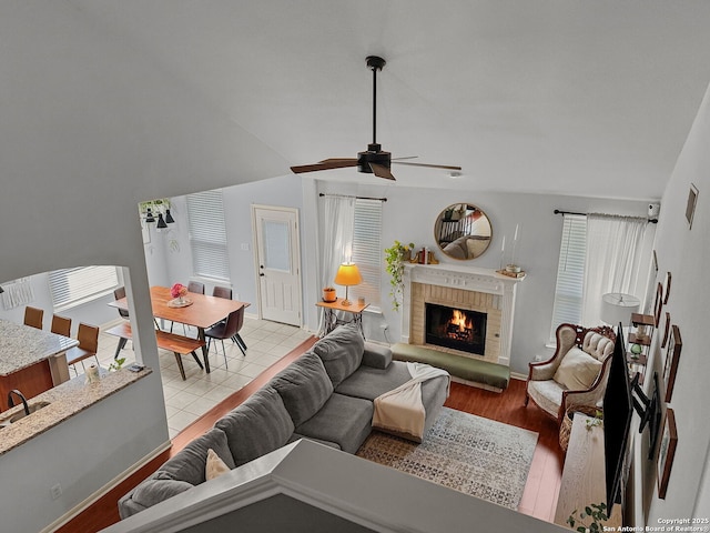 51 Roan, San Antonio, TX 78259 - living area with ceiling fan, wood finished floors, and a fireplace