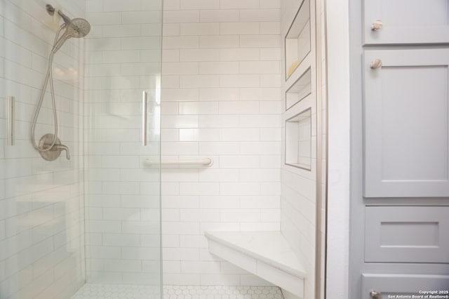 bathroom featuring a shower stall