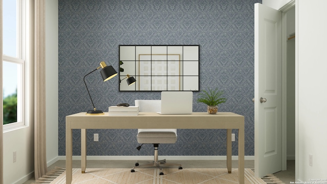 office area featuring baseboards and wallpapered walls